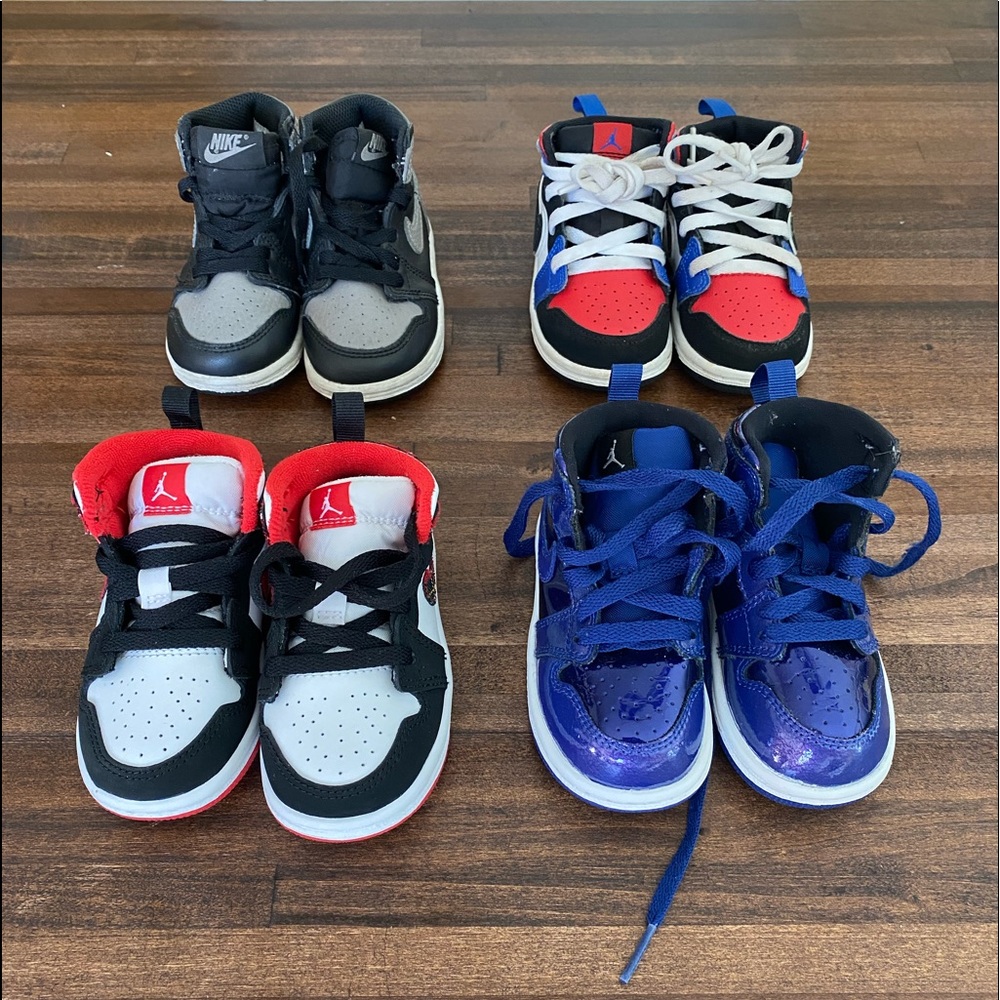 11 pair of Toddler Jordan 1 shoes